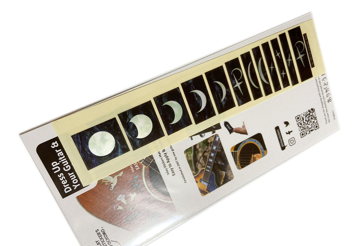 Packaging for guitar decorations with moon phase design by Inlay Sticker's Jockomo