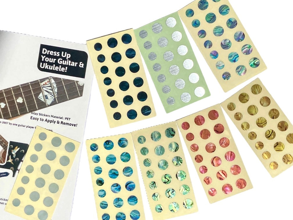 Collection of colorful dot stickers for guitars and ukuleles