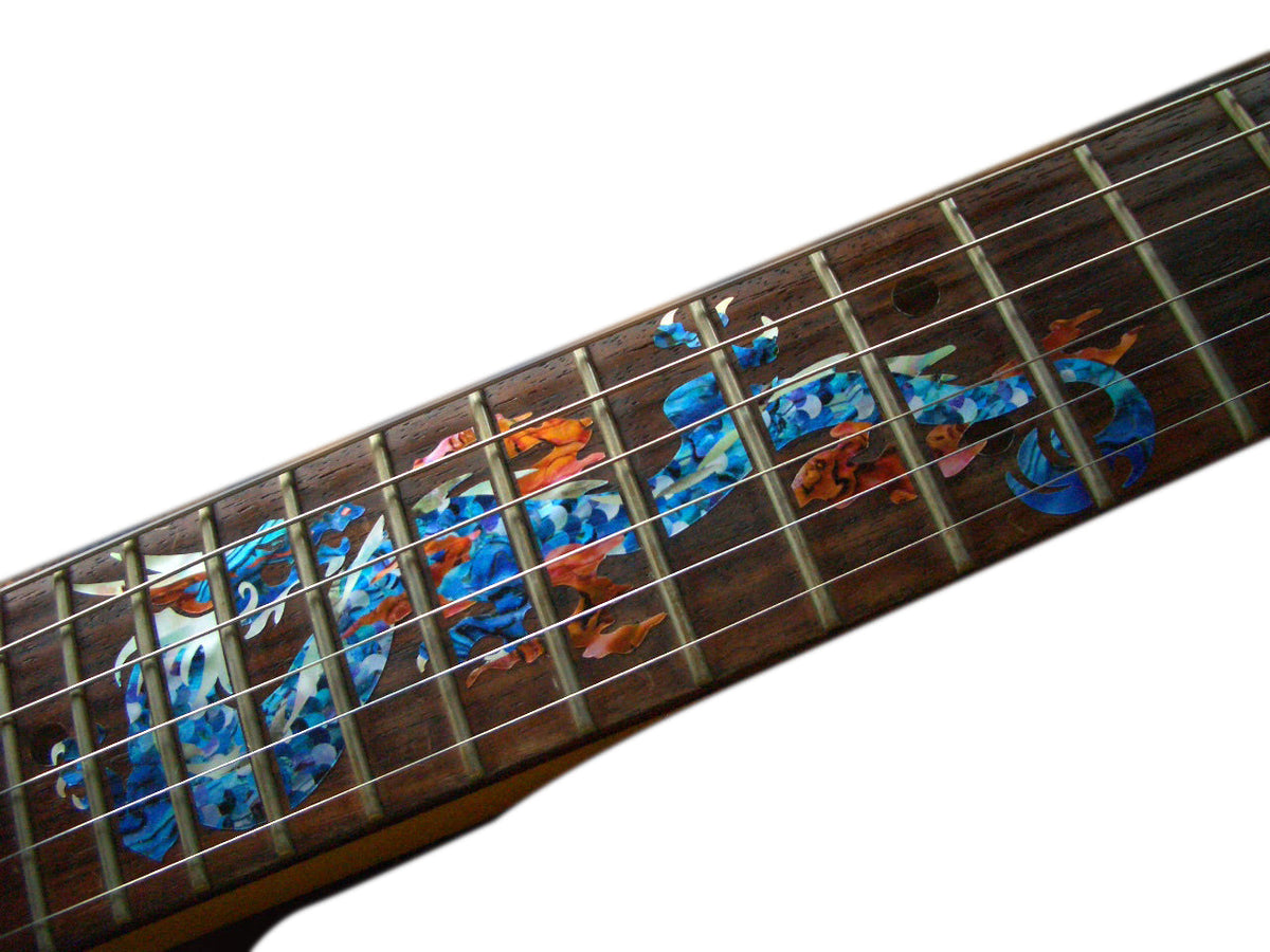 Guitar fretboard with blue dragon inlays