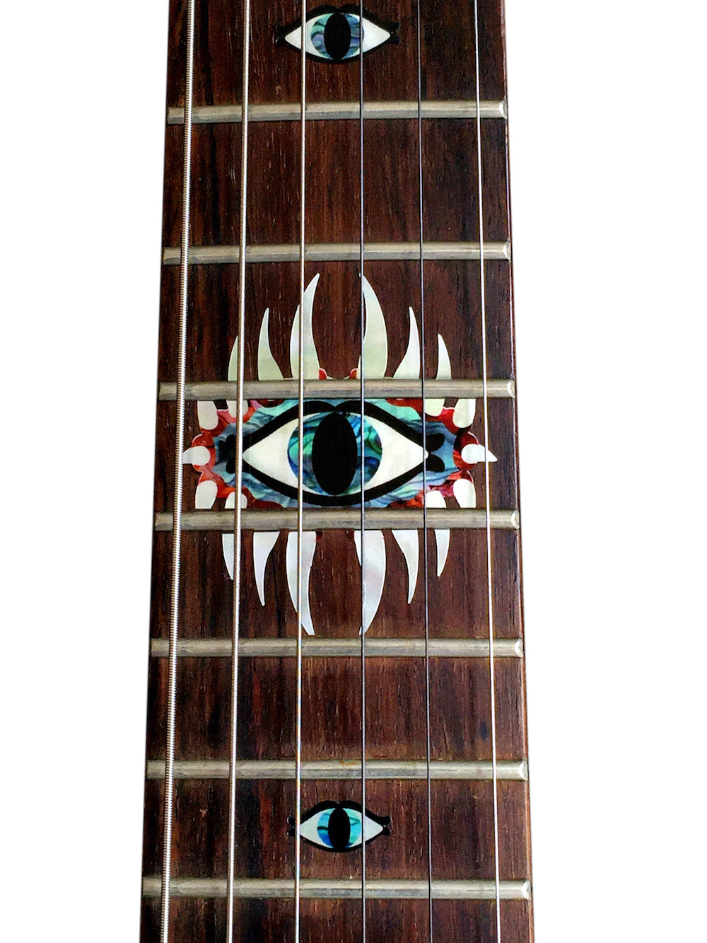 Guitar fretboard with decorative eye inlays