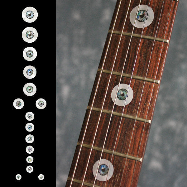 Eyeball fret marker stickers featuring white-pearl eye shapes with abalone-mix iris details arranged as guitar fret markers.